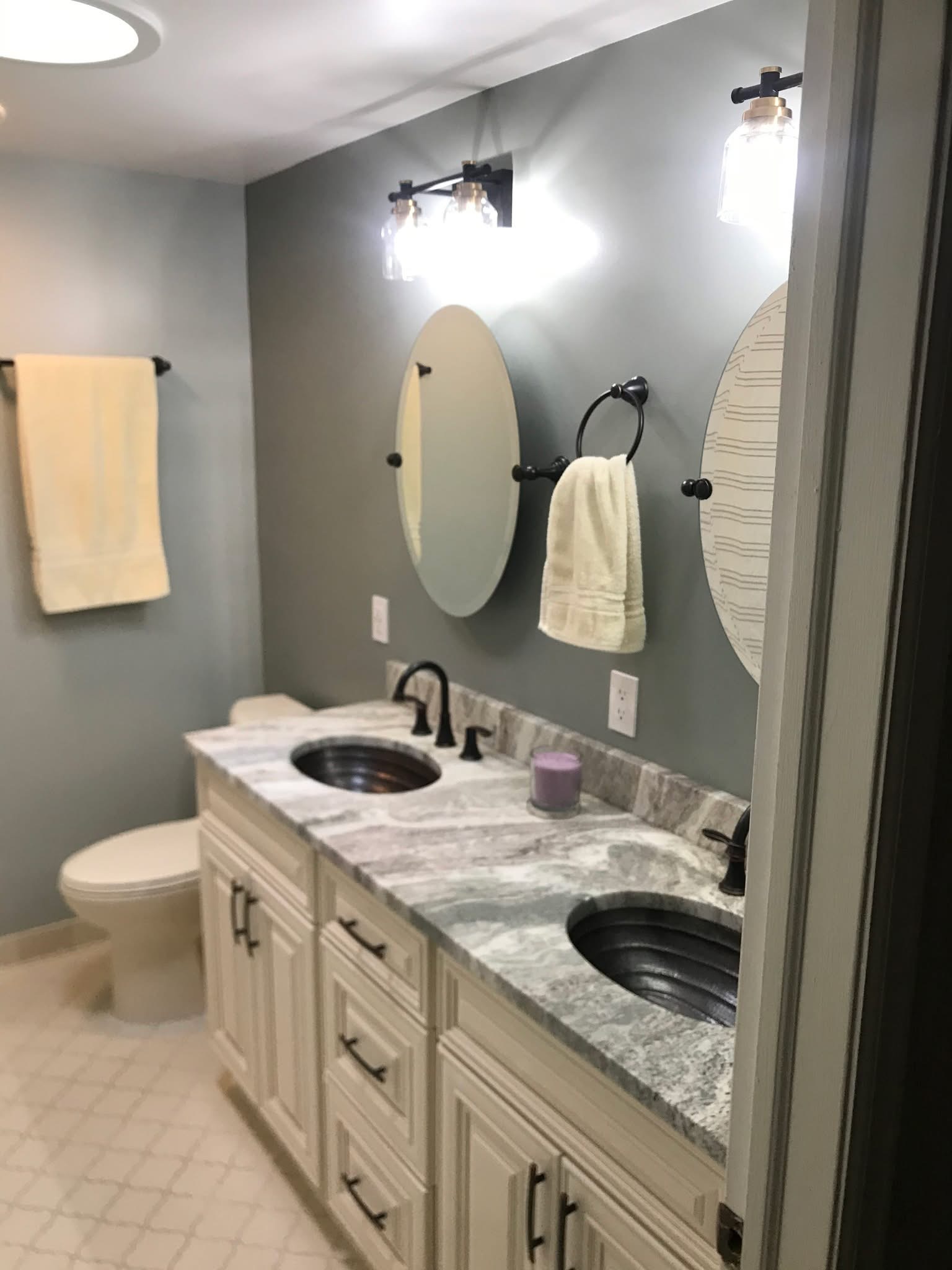 Custom vanity bathroom remodel by Sparrow Contracting in Fenton, Michigan
